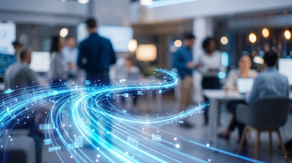 Digital data streams flow through a busy office, representing real-time business information.